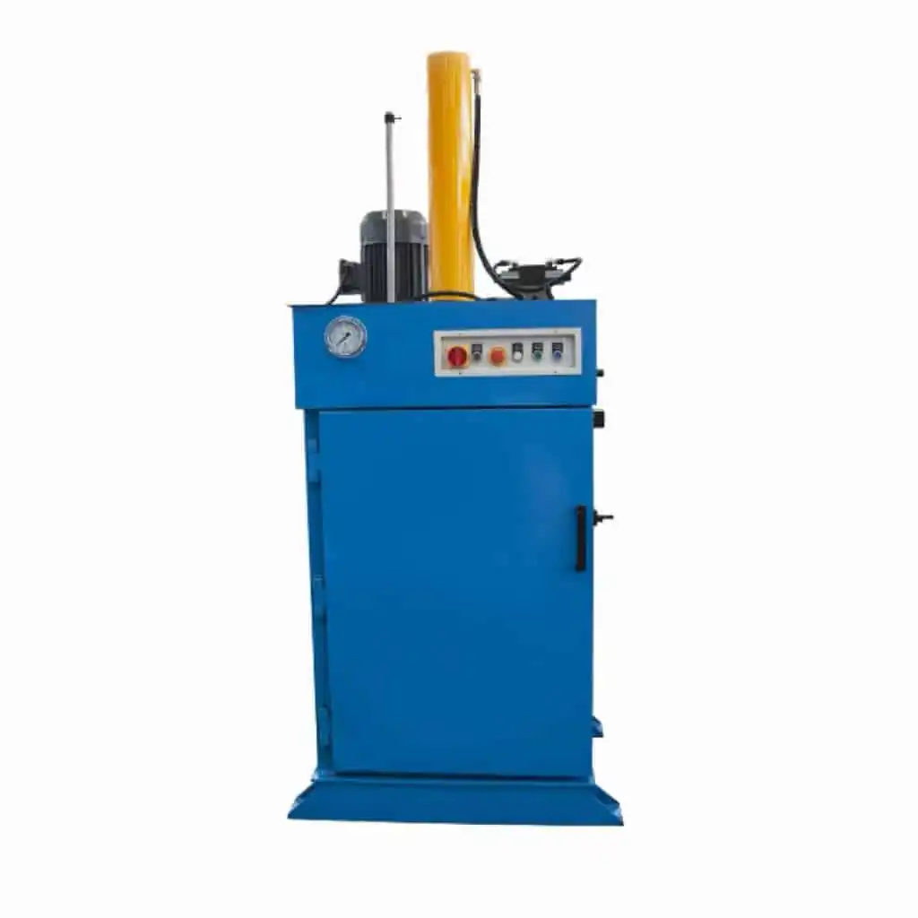 Angled front view of a blue oil drum baler