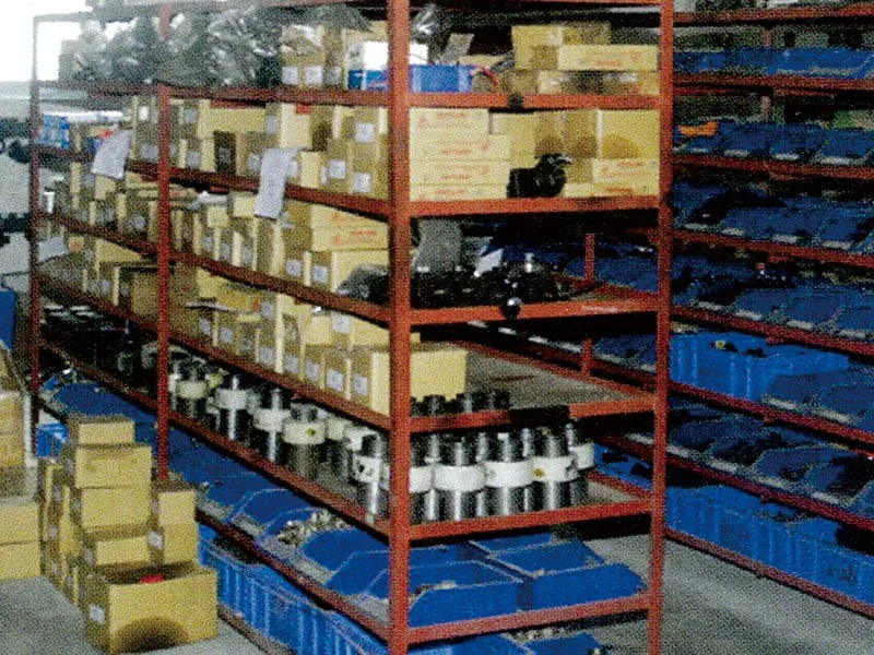 Warehouse shelving containing parts and packaged components